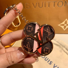 Load image into Gallery viewer, INTO THE FLOWER BAG CHARM AND KEY HOLDER
