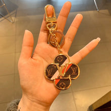Load image into Gallery viewer, INTO THE FLOWER BAG CHARM AND KEY HOLDER
